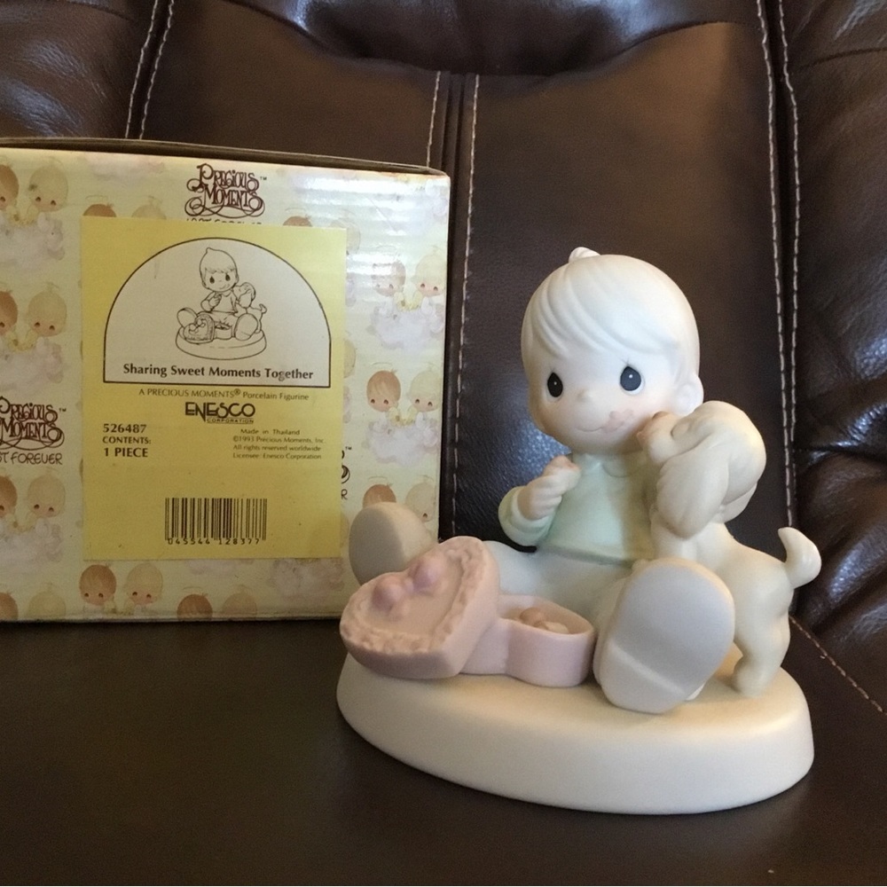 Precious Moments “Sharing Sweet Moments Together” figurine.